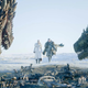 Game of Thrones' Dany and Jon walk toward two dragons who are lurking over a pile of bones.
